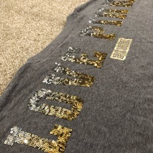 PINK sequined sweatshirt.